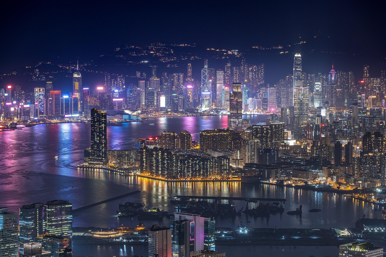 Flights to Hong Kong (HKG) - Victoria Harbor skyline - book airline tickets